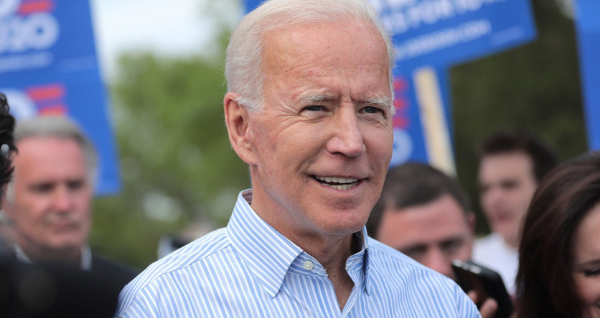 Joe Biden is smiling.