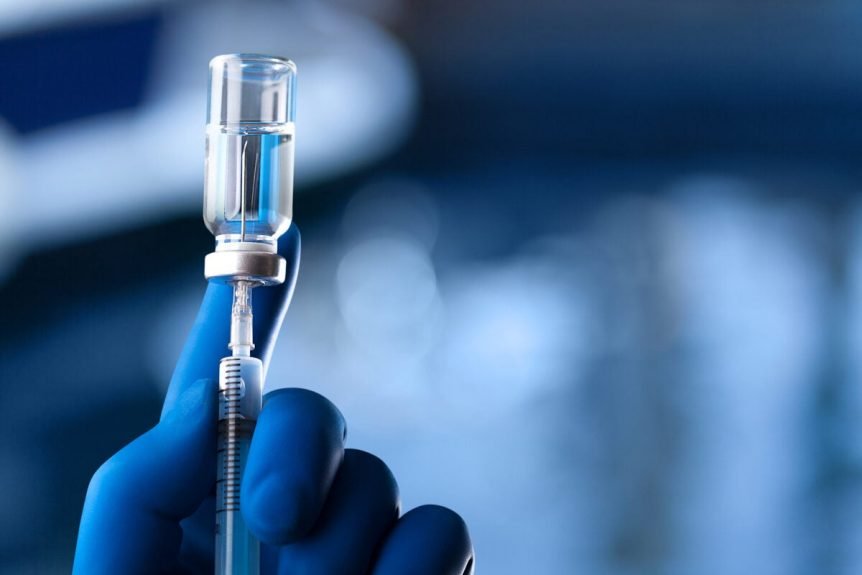 Vaccine injection pouring into the injection