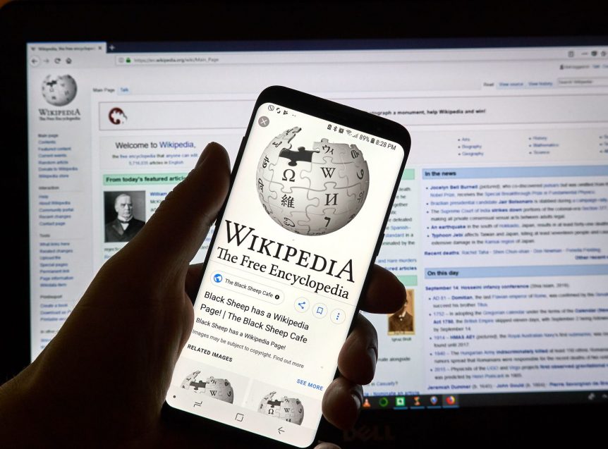 Wikipedia website on both mobile and laptop