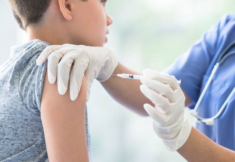Kid is getting vaccine