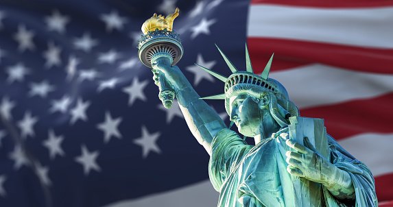Statue of Liberty and the National flag of USA