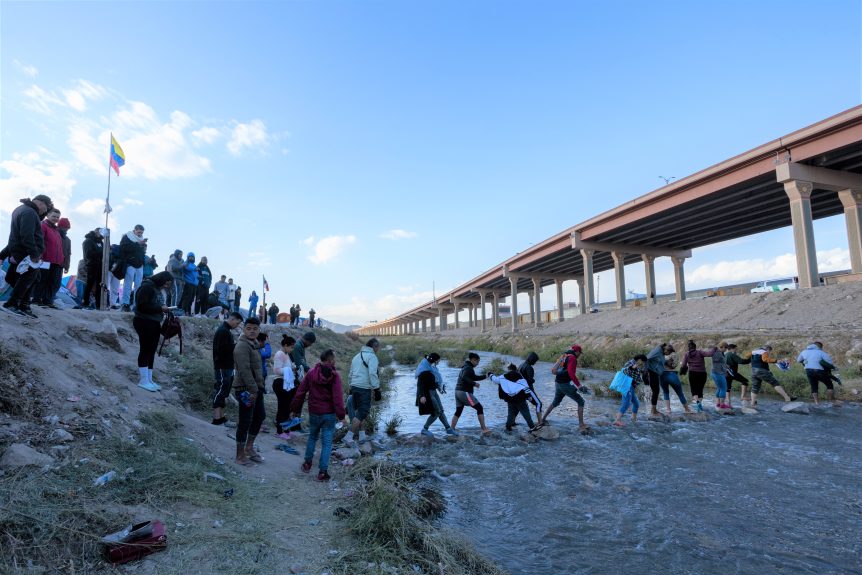 Crowd pass through border's