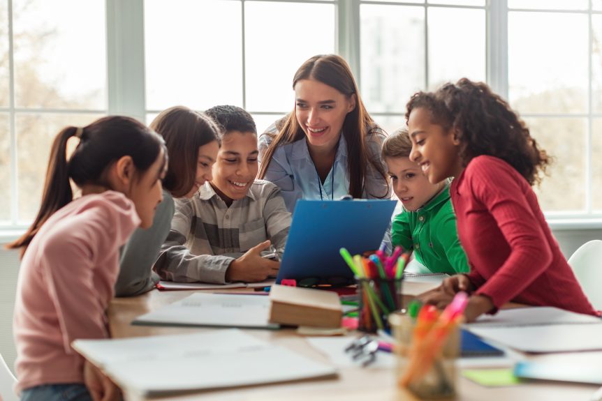 Kids are studying with their teacher