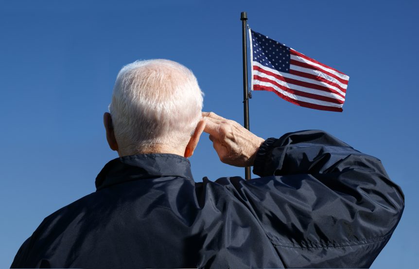 A man salute USA national flag