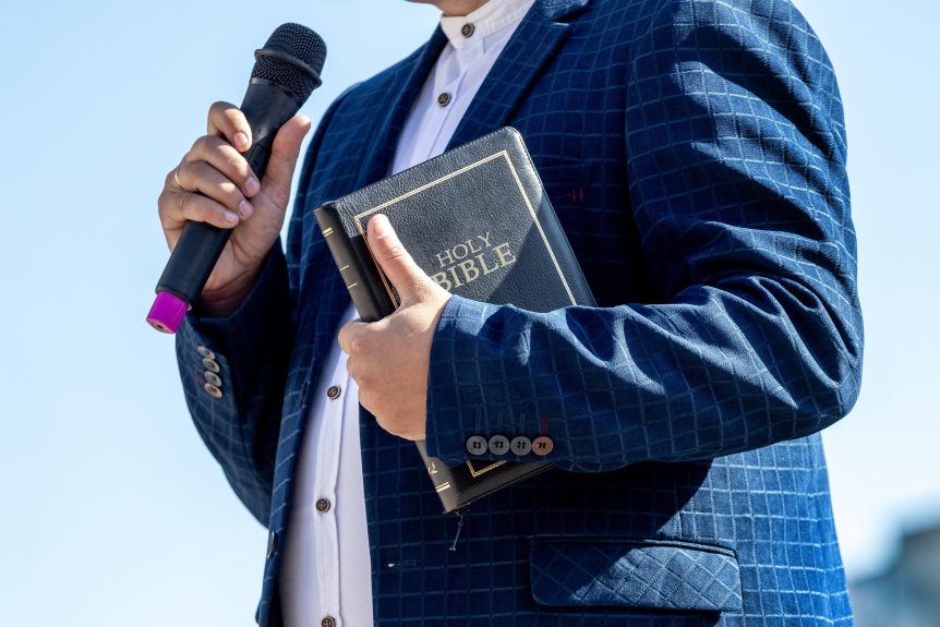 Man holding Bible